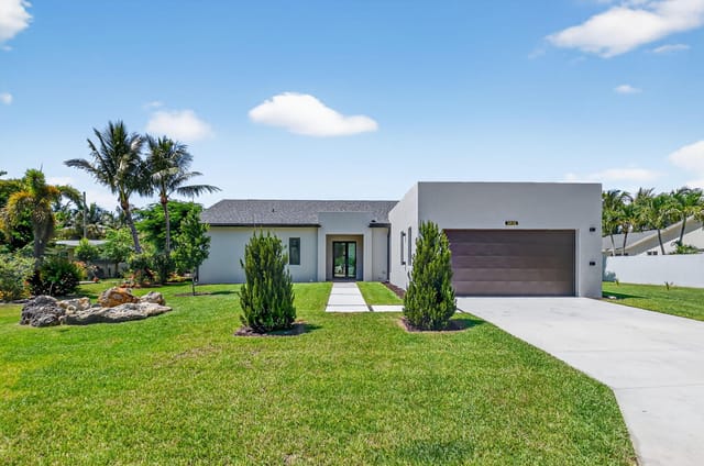 3920 Espan Court, Palm Springs, FL 33461