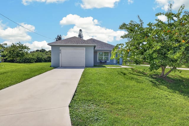 1974 SE GENA Road, Port St. Lucie, FL 34952