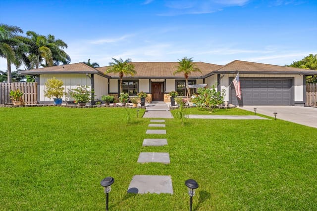 6515 Riparian Road, Atlantis, FL 33462