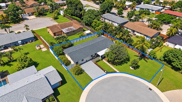 Aerial Blue-Boundary Suburban Property
